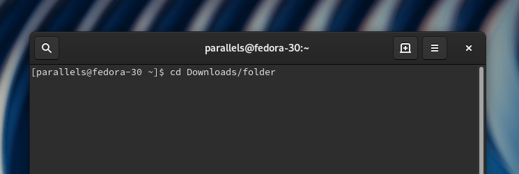 Команда cd Downloads/folder, введенная в терминал дистрибутива Fedora