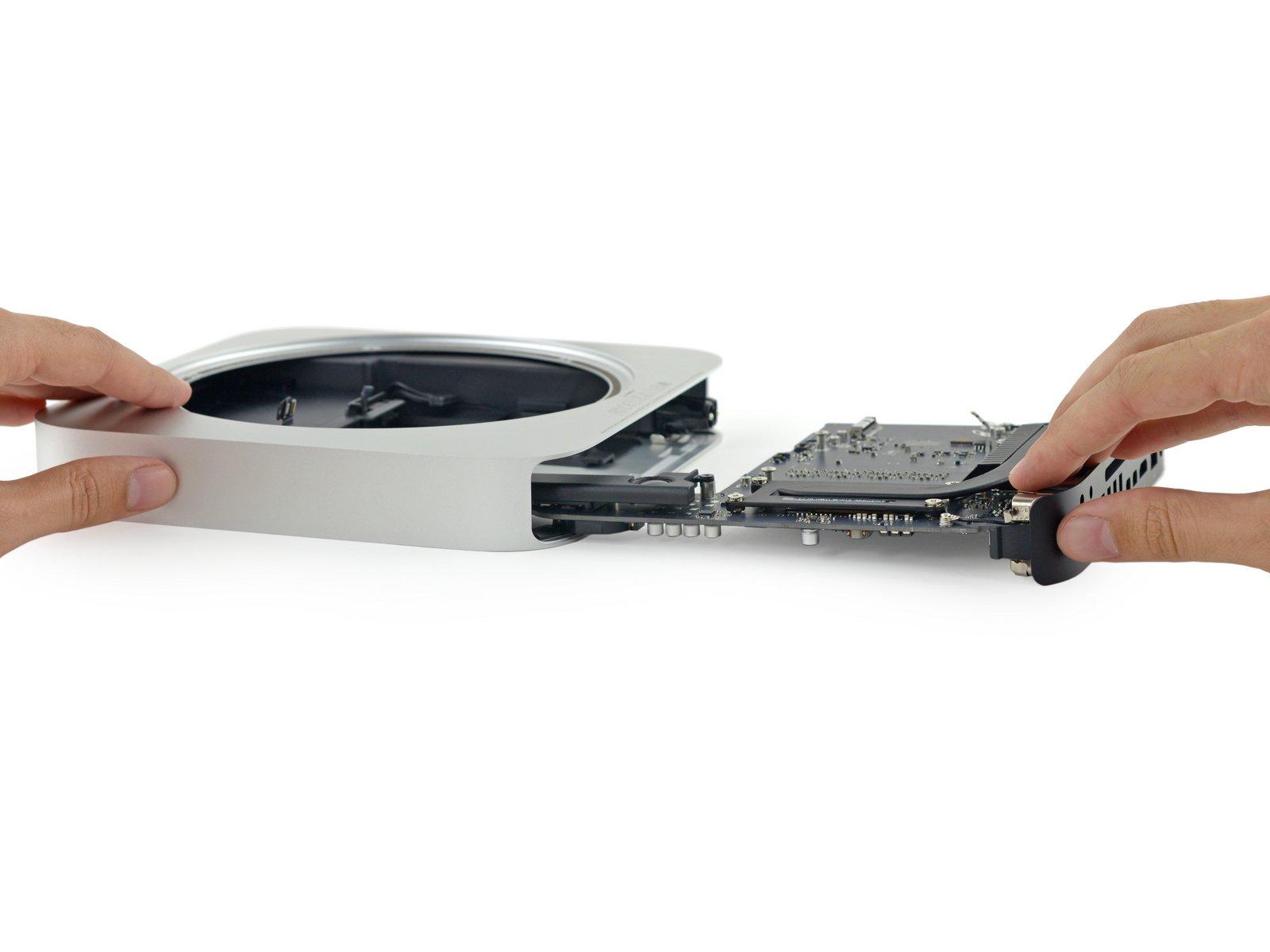 UWhJ3DW5fOgCTaSi.huge.jpg Извлеченная микросхема Mac mini